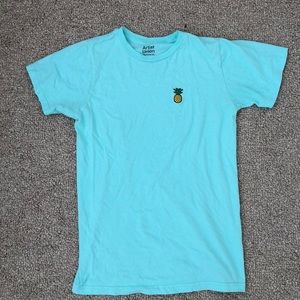 Bright turquoise t shirt w/ embroidered pineapple